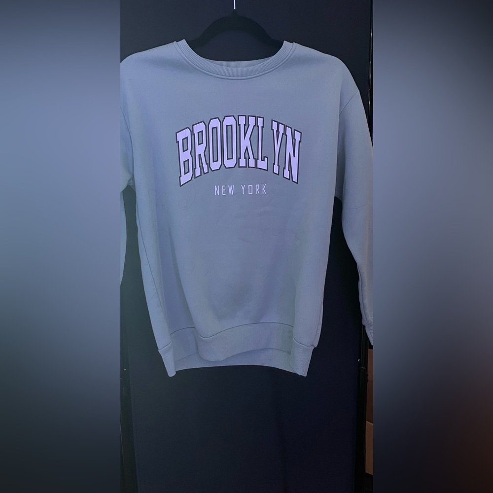 mint green sweatshirt